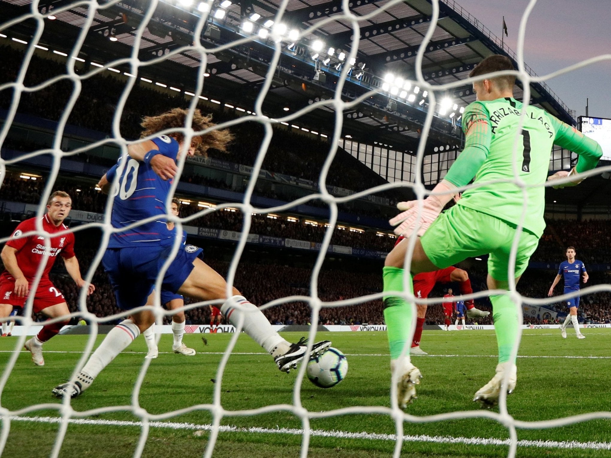 David Luiz clears a goal-bound shot off the line