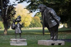Statue of Matilda standing defiantly in front of Donald Trump unveiled