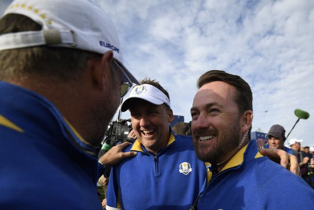 Europe's Ian Poulter and Europe's vice-captain Graeme McDowell