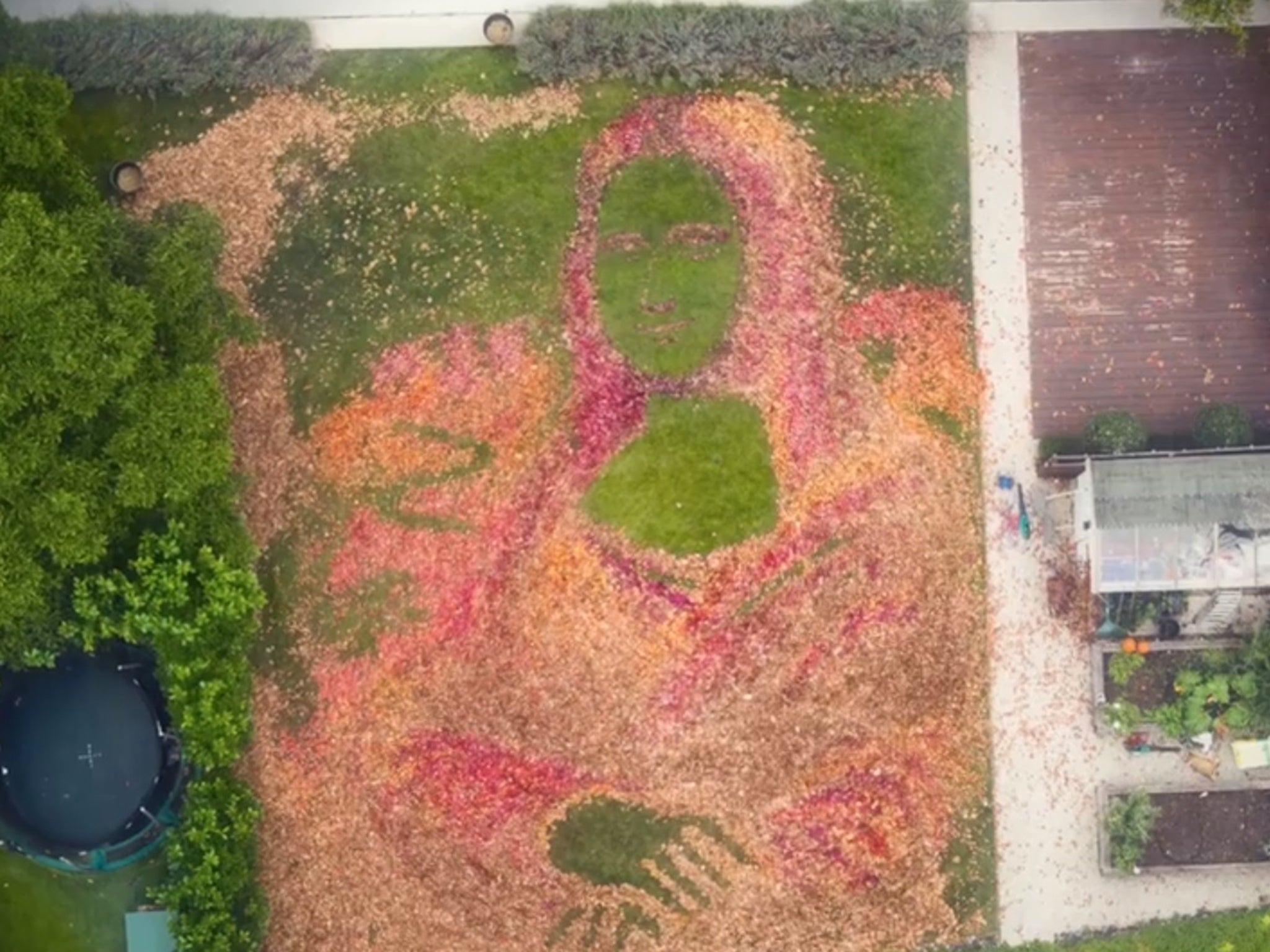 Artist Taps Into Autumn To Create Giant Mona Leafa Portrait Images, Photos, Reviews