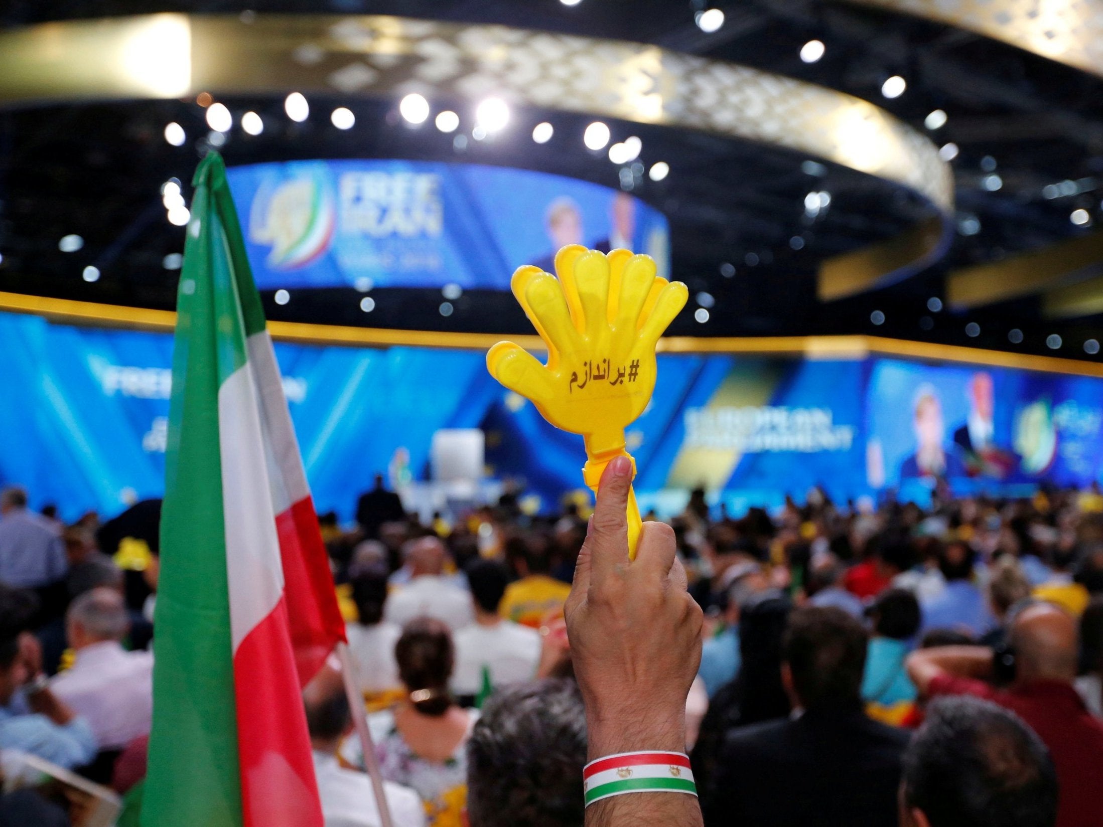 Supporters of Maryam Rajavi, president-elect of the National Council of Resistance of Iran (NCRI), attend a rally in Villepinte, near Paris, France, 30 June 2018