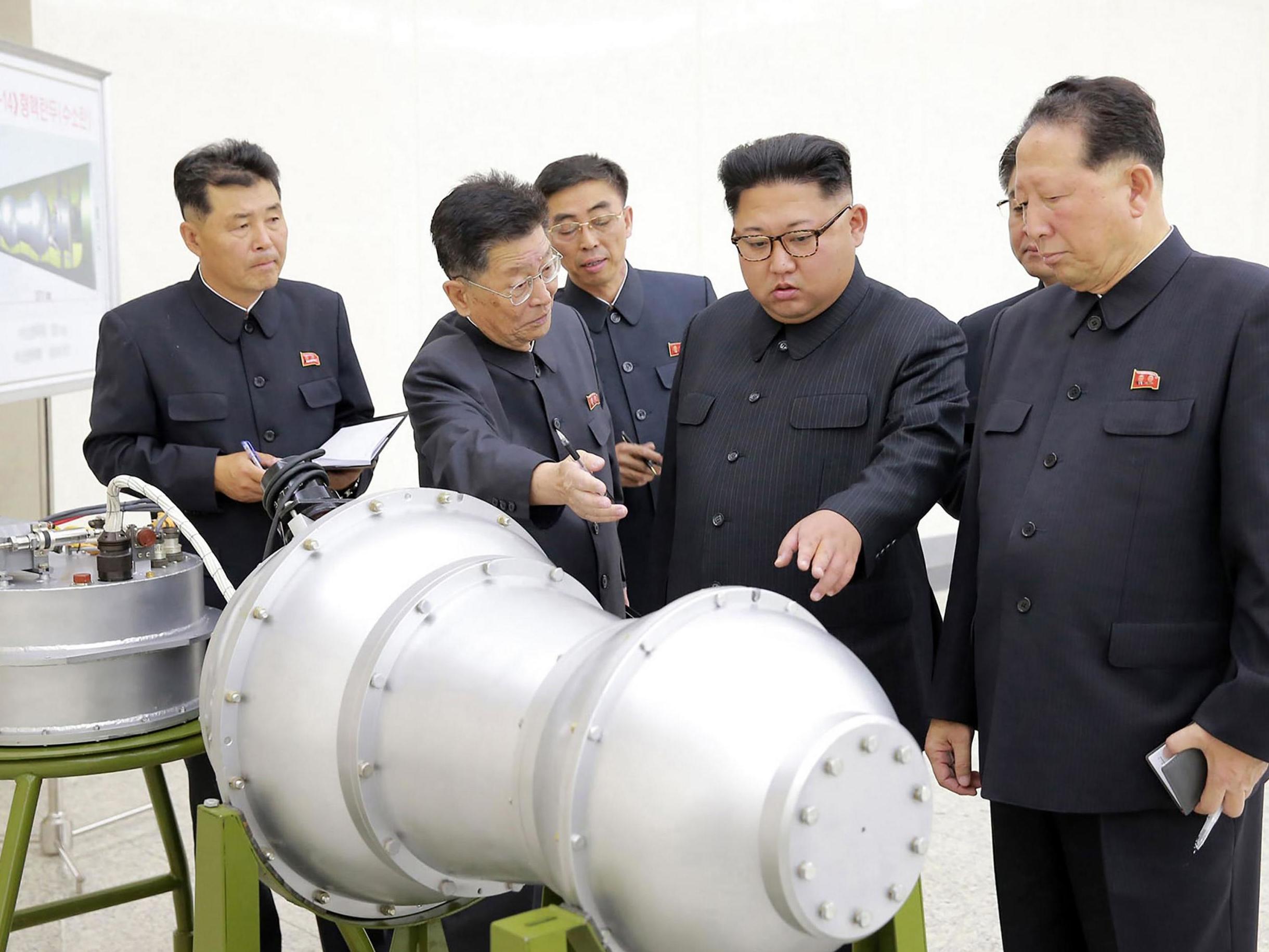 Kim Jong-Un inspects what is purported to be a nuclear device in September 2017