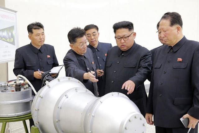 Kim Jong-Un inspects what is purported to be a nuclear device in September 2017