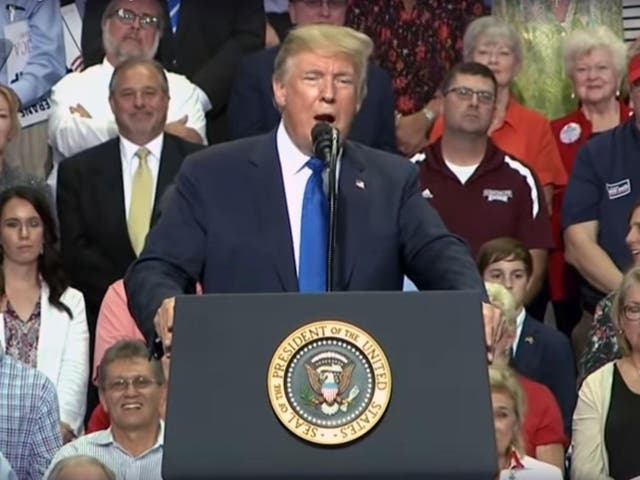 Trump mocks Christine Blasey Ford, the woman who claimed she was sexually assaulted by Supreme Court nominee Brett Kavanaugh decades ago, at a campaign rally in Mississippi