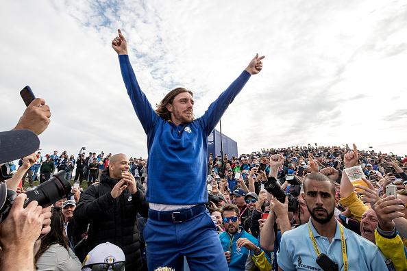 Tommy Fleetwood celebrates victory with the crowd after the singles matches of the 2018 Ryder Cup at Le Golf National