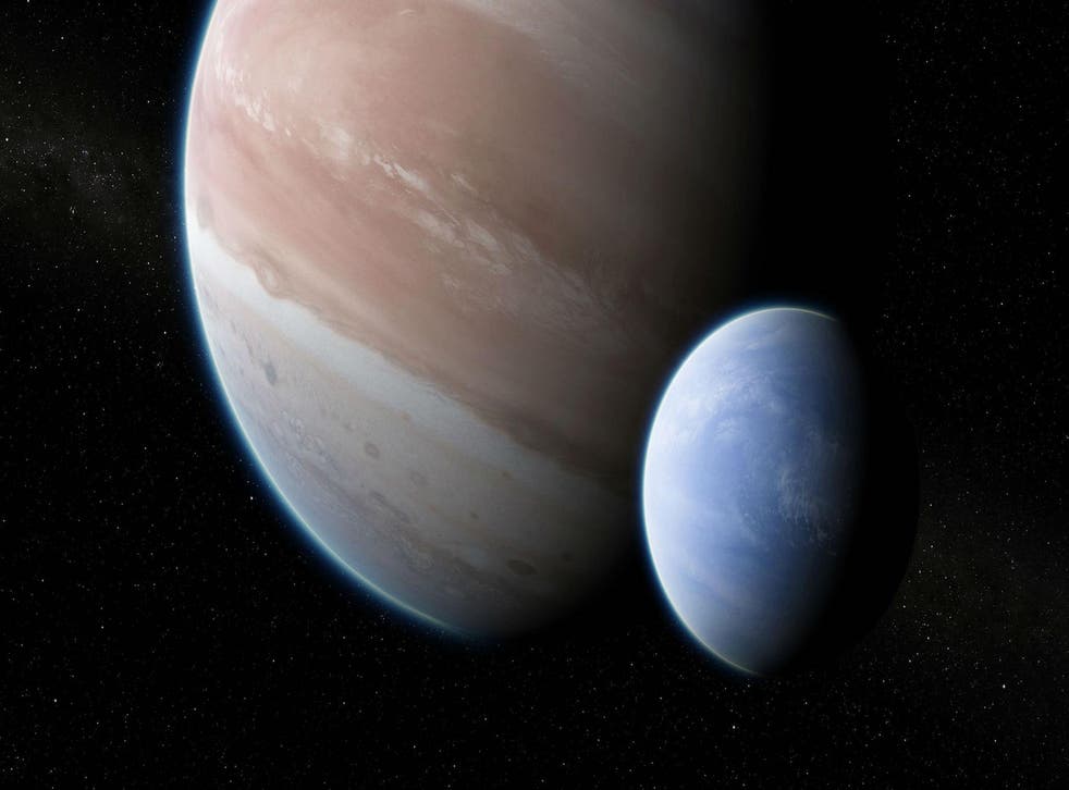 This is an artist's impression of the exoplanet Kepler-1625b, transiting the star, with the candidate exomoon in tow