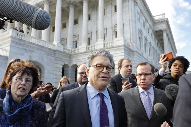 US Senator Al Franken (D-MN) departs the U.S. Capitol with his wife Franni after announcing his resignation over allegations of sexual misconduct