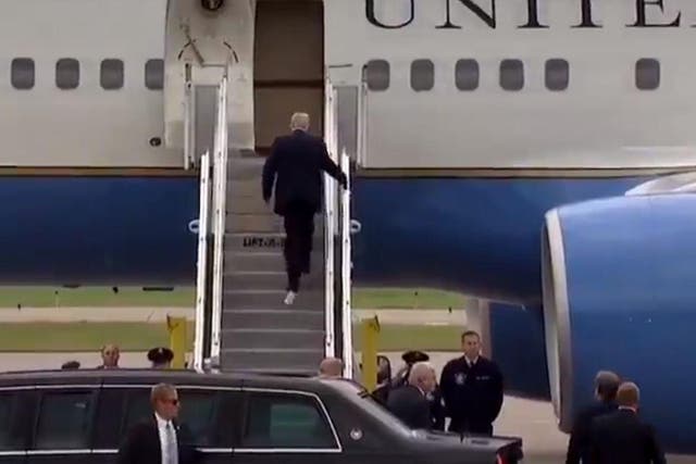 Donald Trump appeared not to notice the paper trailing from his left heel