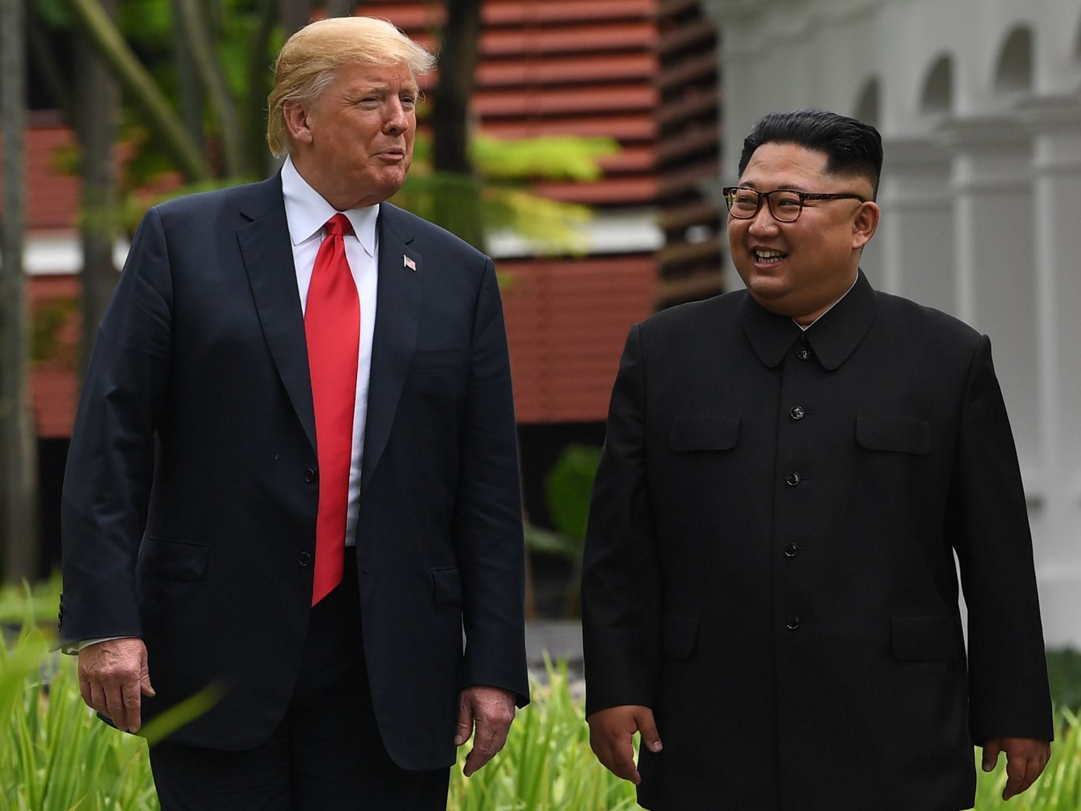Donald Trump walks with Kim Jong-un during the historic summit in June 2018