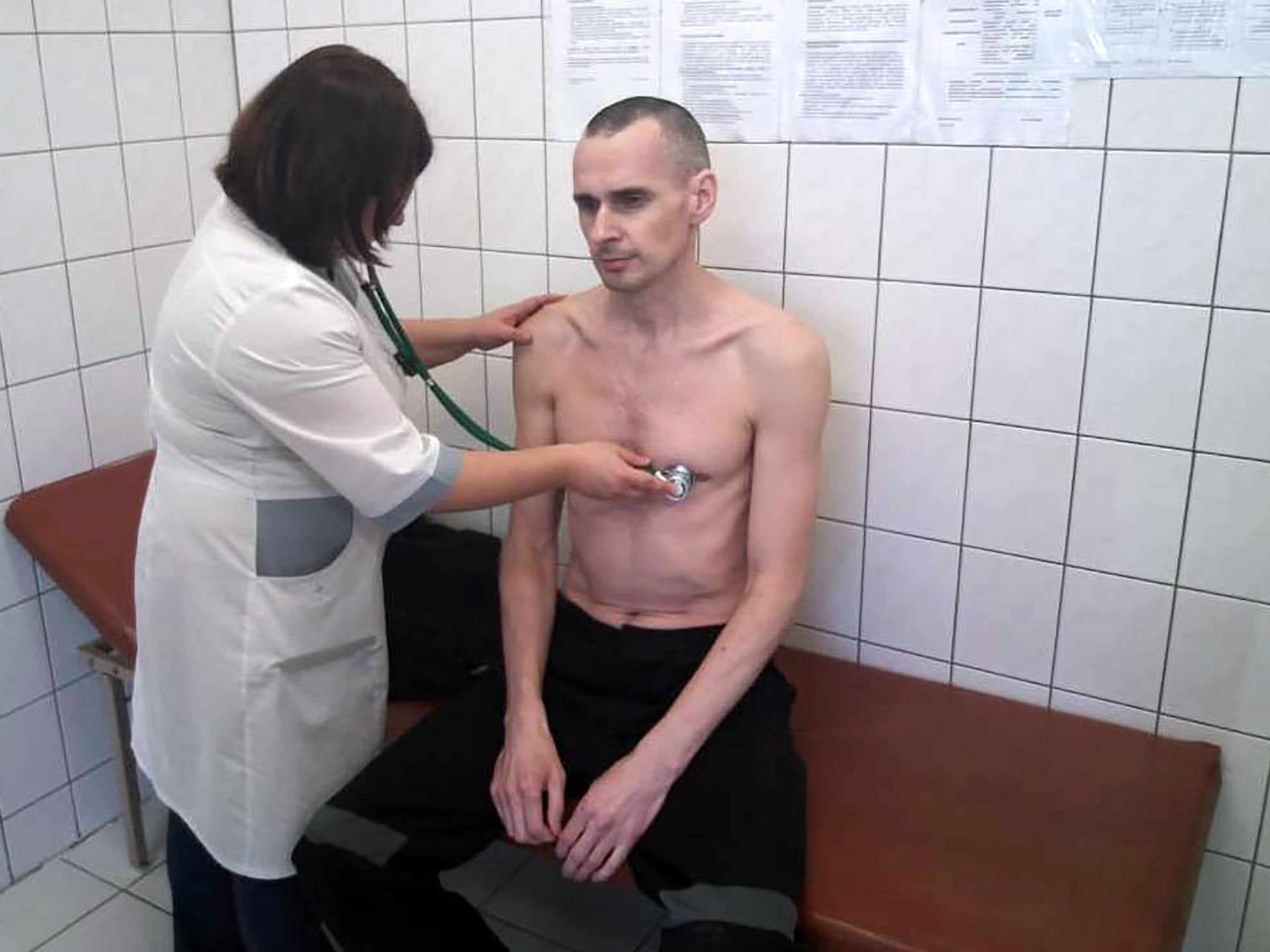 An emaciated Sentsov undergoes a medical examination at a state hospital in Labytnangi on 28 September