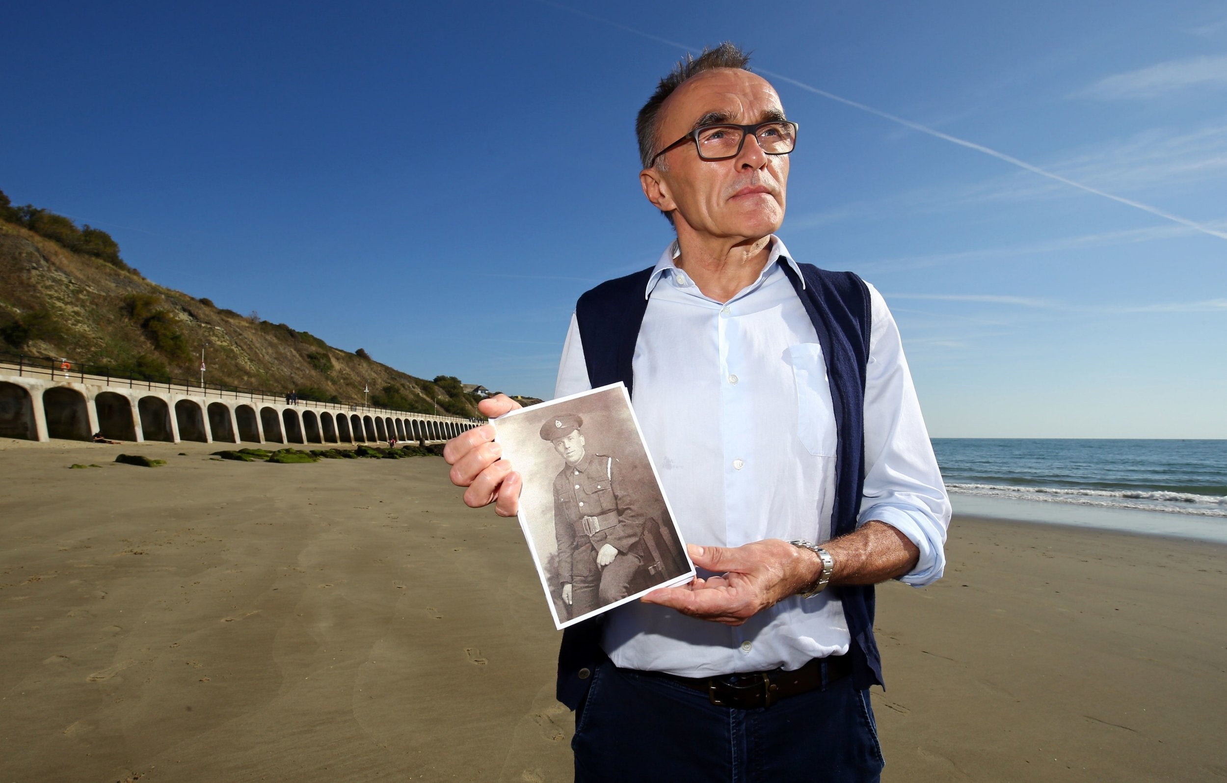 Filmmaker Danny Boyle holds a photograph of Private Walter Bleakley, who was from the same street where Danny went to school, as he announces plans for his Armistice Day commission