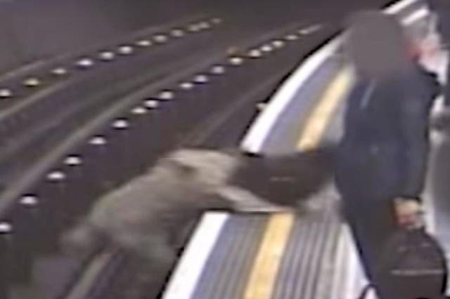 CCTV footage shows Sir Robert Malpas being pushed onto the Tube tracks on 27 April 2018. Paul Crossley was found guilty of two counts of attempted murder on 5 October 2018.