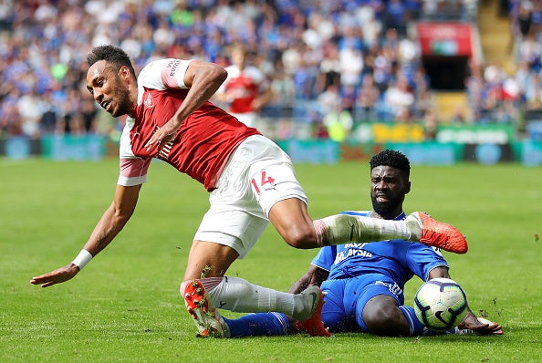 Bruno Manga tackles Arsenal’s Pierre-Emerick Aubameyang