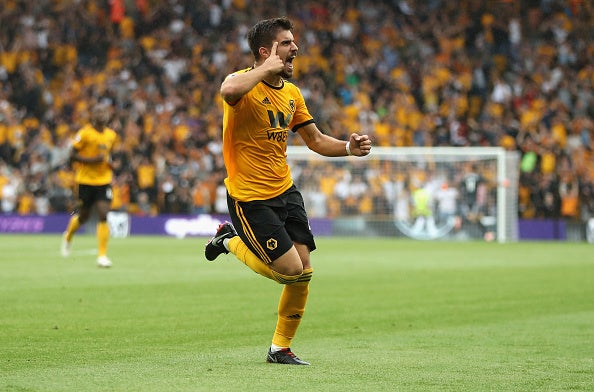 Ruben Neves celebrates scoring against Everton