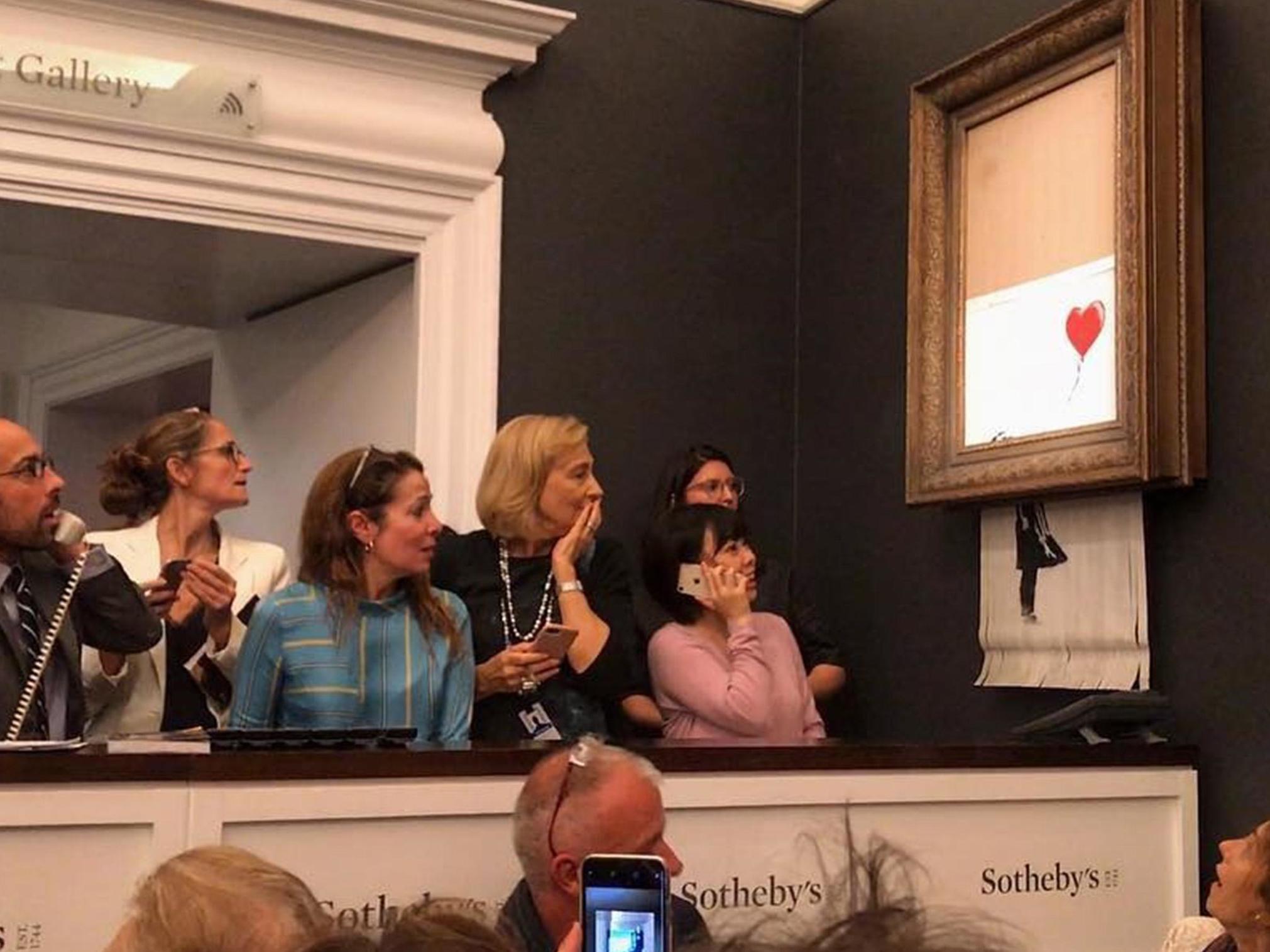Those present in the Sotheby’s auction house in London were visibly shocked after witnessing the stunt