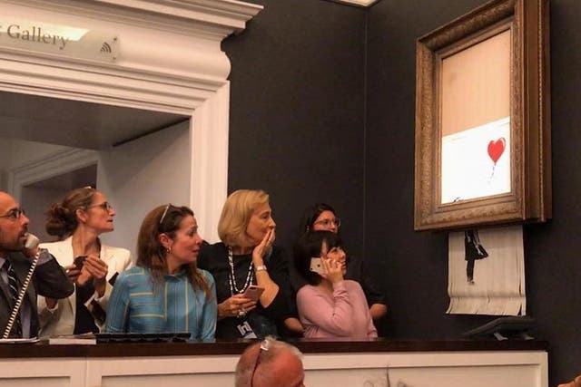 Those present in the Sotheby’s auction house in London were visibly shocked after witnessing the stunt