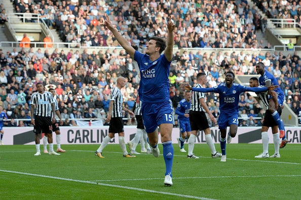 Harry Maguire celebrates after scoring against Newcastle