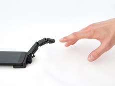 Smartphone robot finger lets devices crawl and touch users