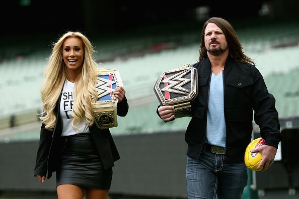 AJ Styles and Carmella ahead of their bouts