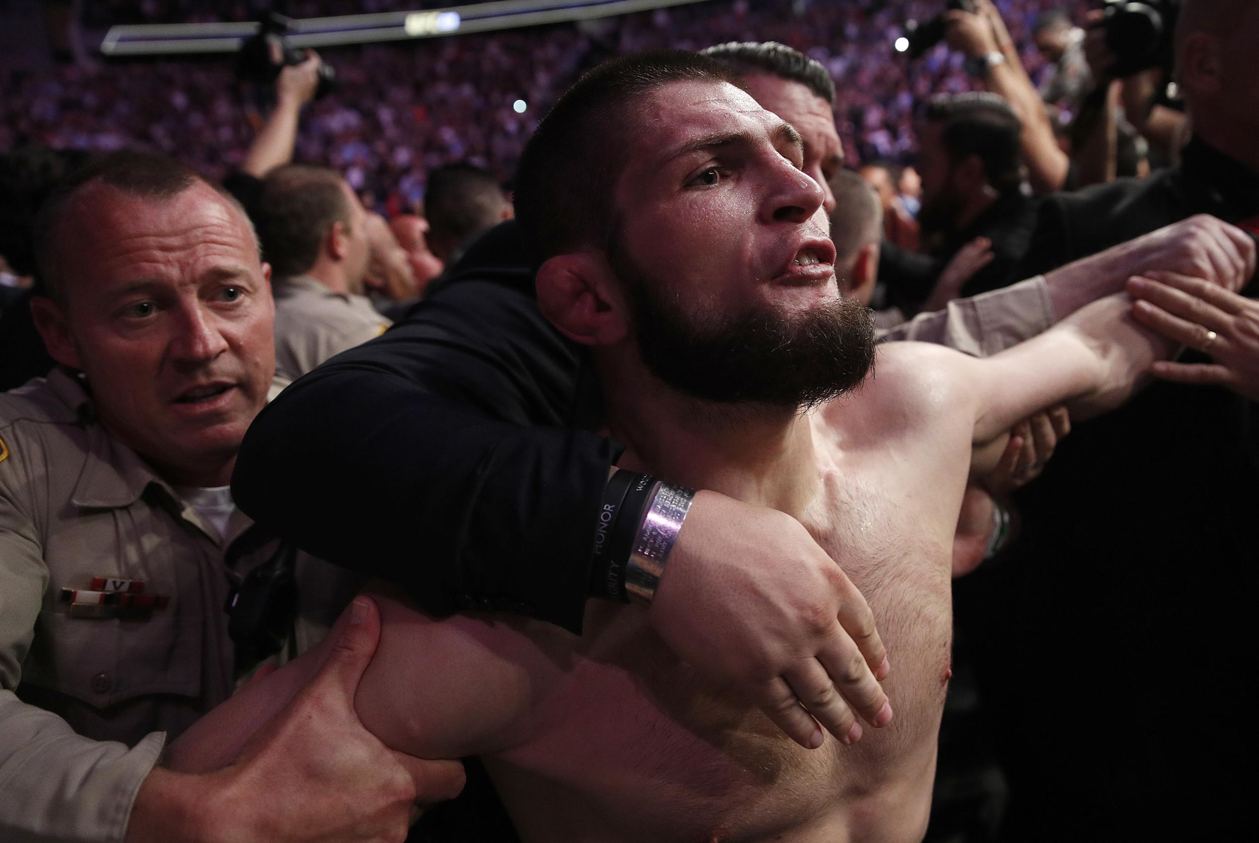 Khabib has to be taken out of the Arena by police