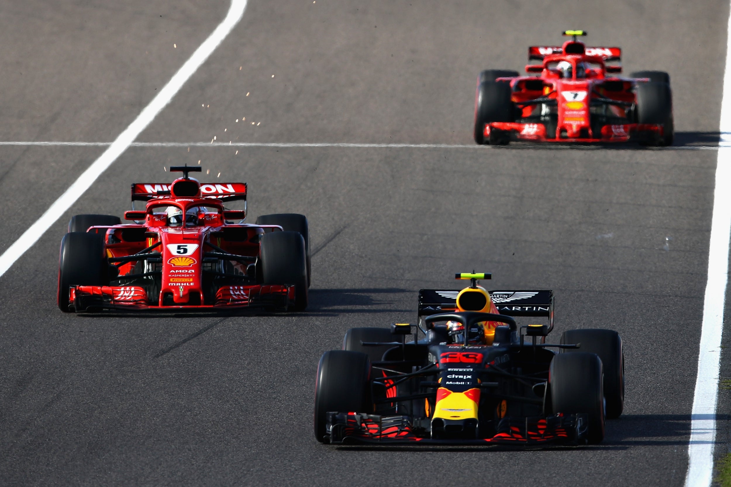 Vettel spun after contact with Verstappen at the Spoon Curve (Getty)