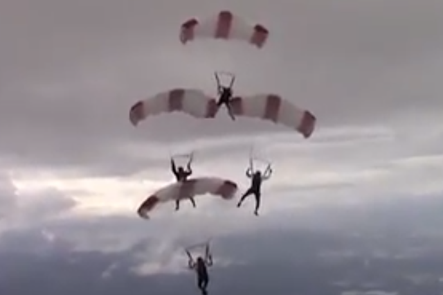 The Qatari team was attempting a complicated mid-air formation when two members parachutes became entwined