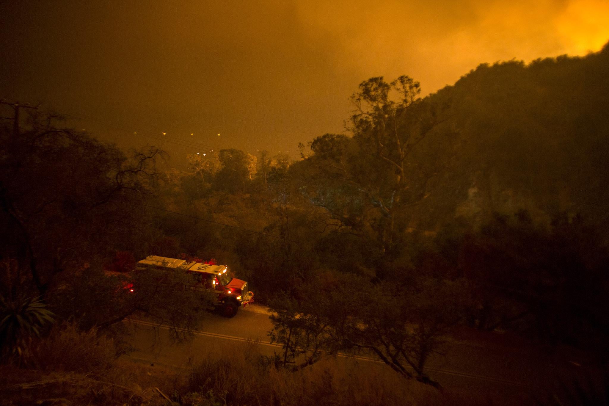 The Thomas Fire, feeding on thick chaparral brush which hasn&Atilde;t burned in generations, approaches homes on December 12, 2017 in Montecito, California
