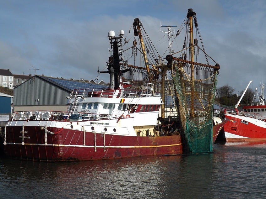 A beam trawler sits at the dock in Milford Haven, Wales