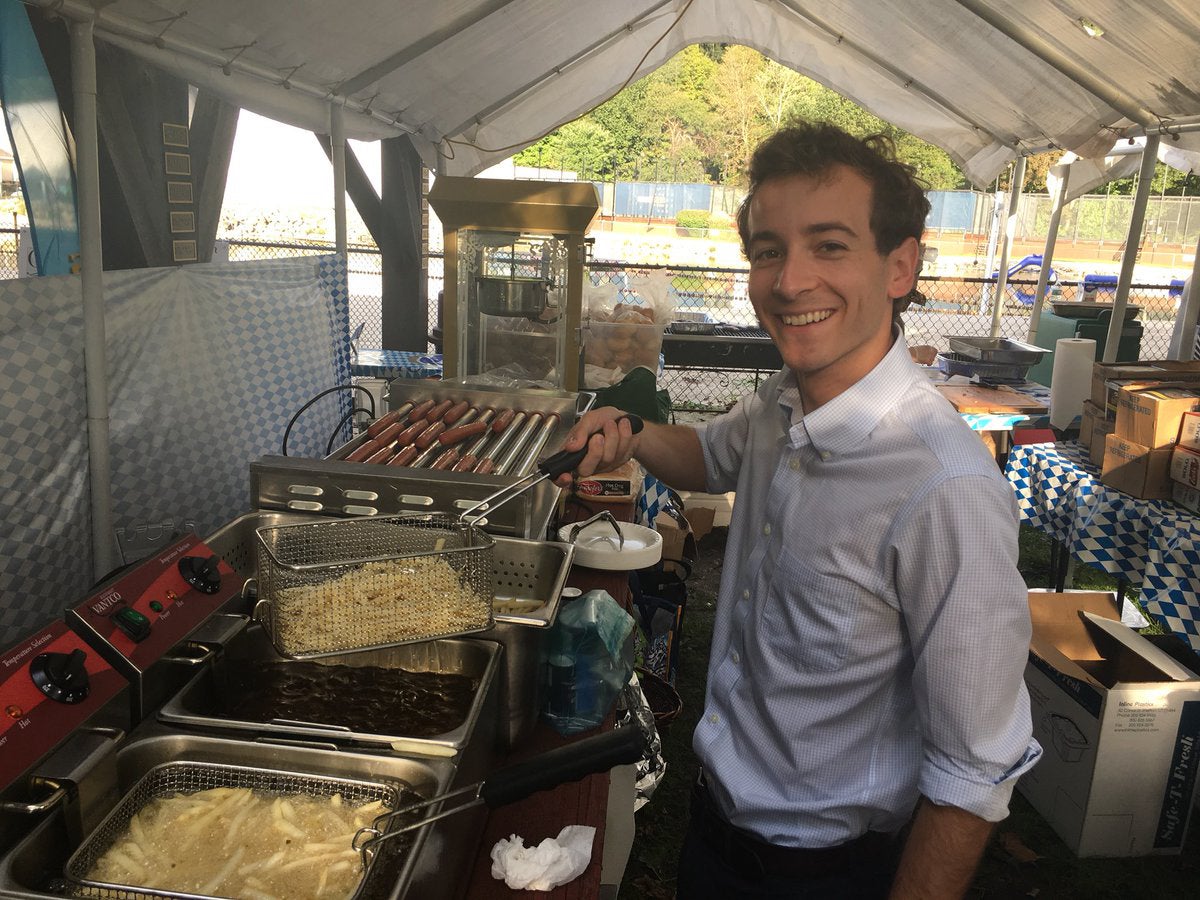 Will Haskell met voters while serving French fries and hotdogs at Oktoberfest in Wilton, Connecticut