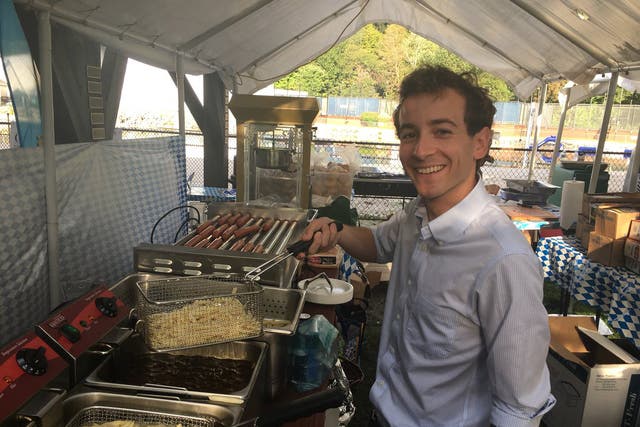 Will Haskell met voters while serving French fries and hotdogs at Oktoberfest in Wilton, Connecticut