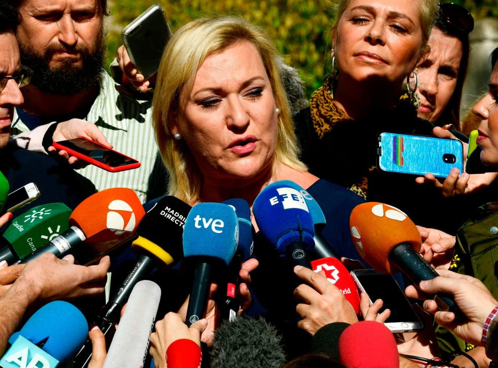 Ines Madrigal speaks to journalists outside the Madrid court.