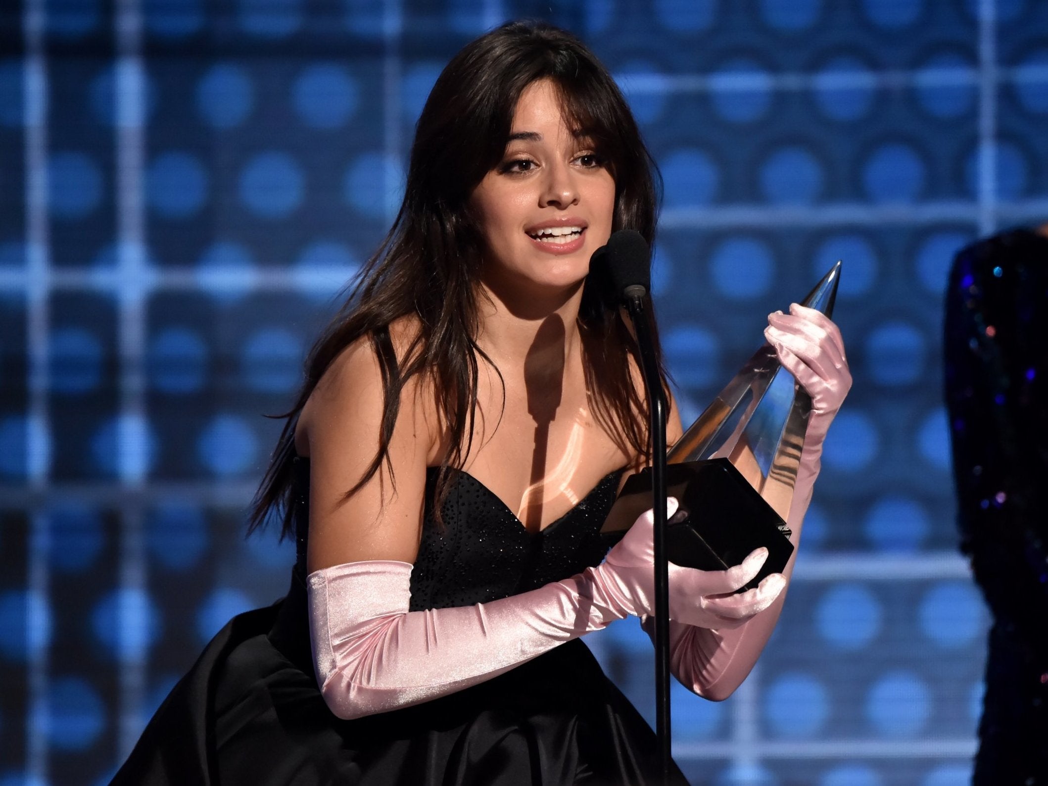 Camila Cabello accepts her AMA award for New Artist of the Year
