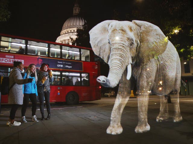 A life-size hologram of an African elephant was created by WWF in London to highlight how the animals could disappear