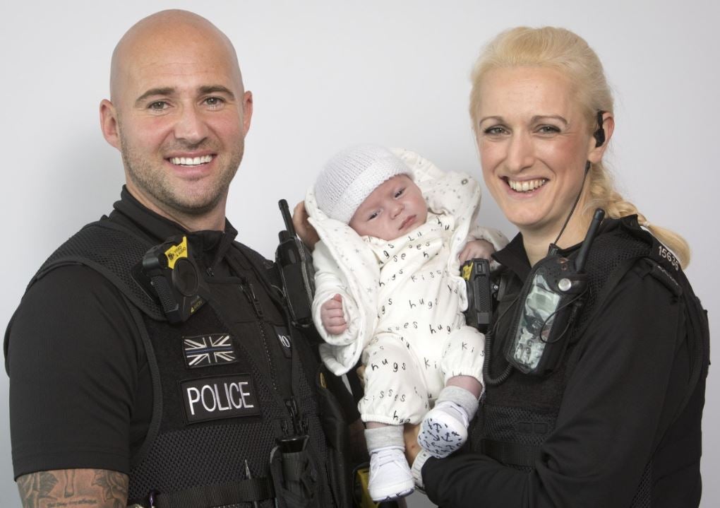 PC Kieran Sweeney and PC Claire Slater pose with baby Issac