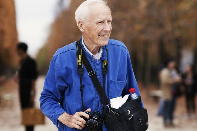 Bill Cunningham was immediately identifiable, always dressed in the same blue French worker’s jacket