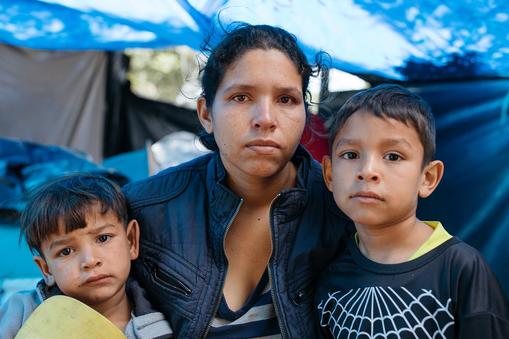 Nazareth Pirloiria and her partner and children walked for 20 days through Columbia to get to the Carcelen bus terminal, where they are now living in a makeshift shelter (Padding Dowling)