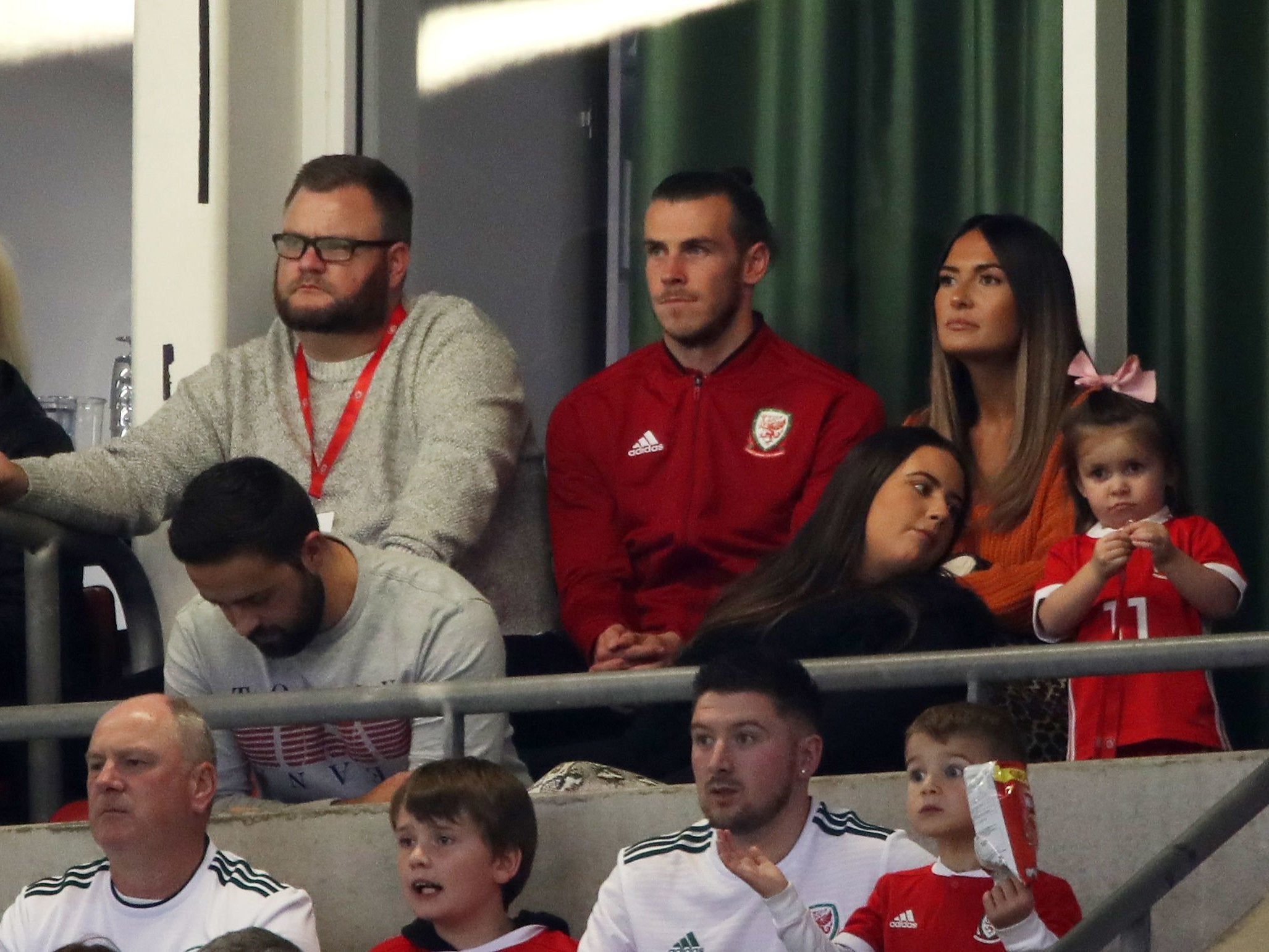 Gareth Bale, who watched the game with partner Emma Rhys-Jones, is struggling to regain his fitness in time to face Ireland