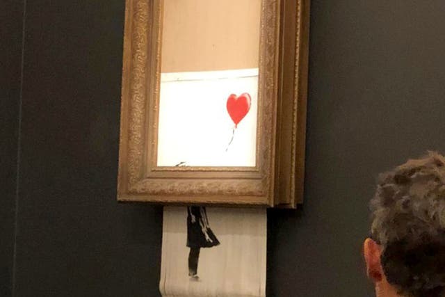 Girl With Balloon shredded itself after being sold for more than £1m at auction