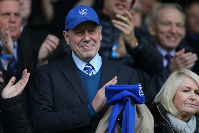 Portsmouth chairman Michael Eisner applauds the players at Fratton Park