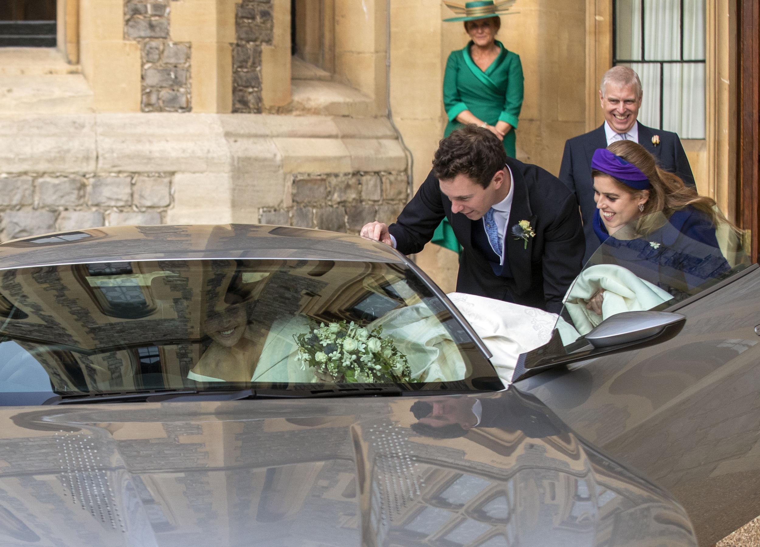 Princess Eugenie required help getting her gown in the car (Getty)