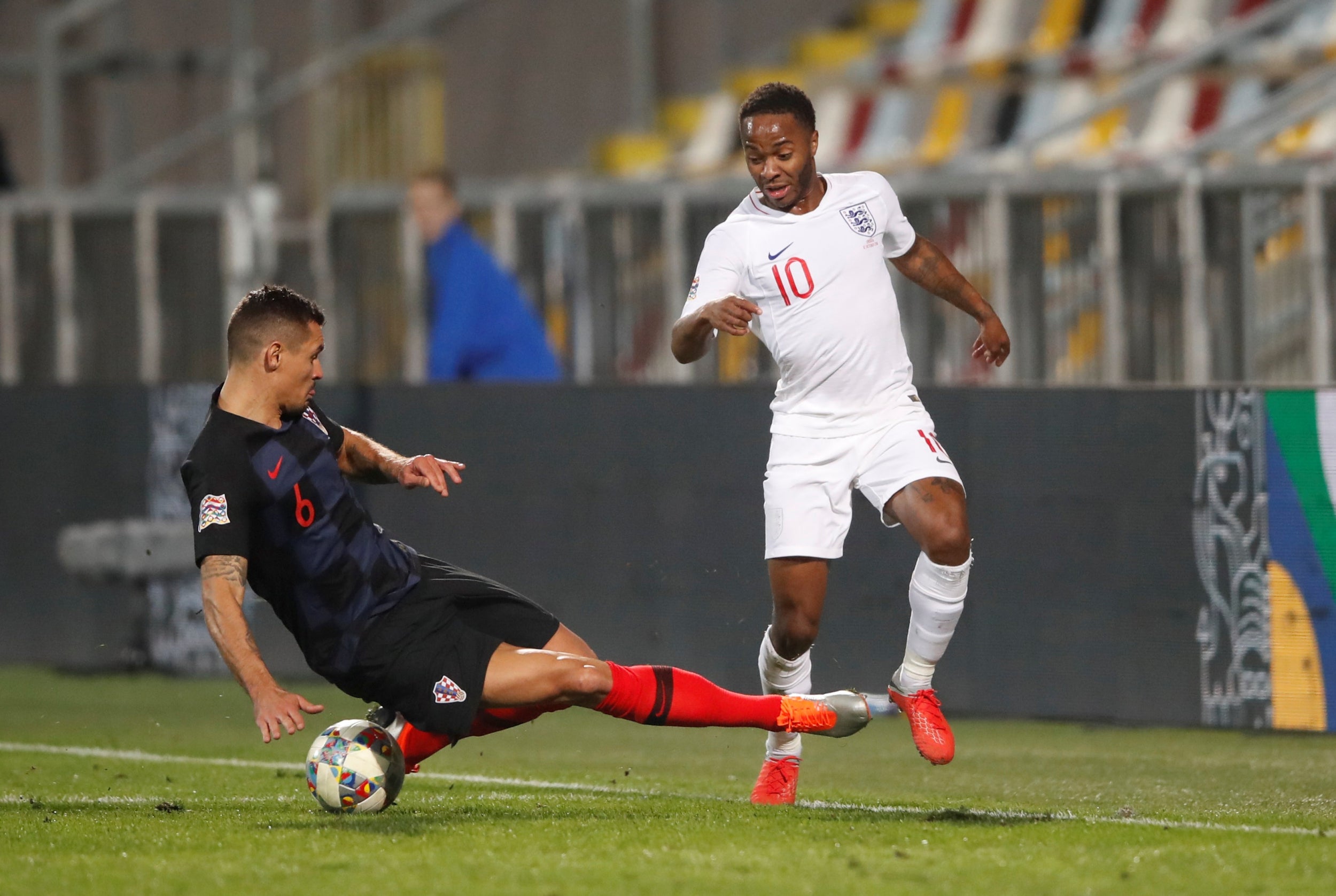 Raheem Sterling darts around Dejan Lovren