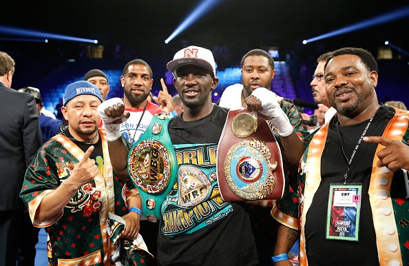 Terence Crawford celebrates with his team after defeating Australia's Jeff Horn