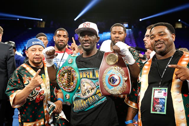 Terence Crawford celebrates with his team after defeating Australia's Jeff Horn