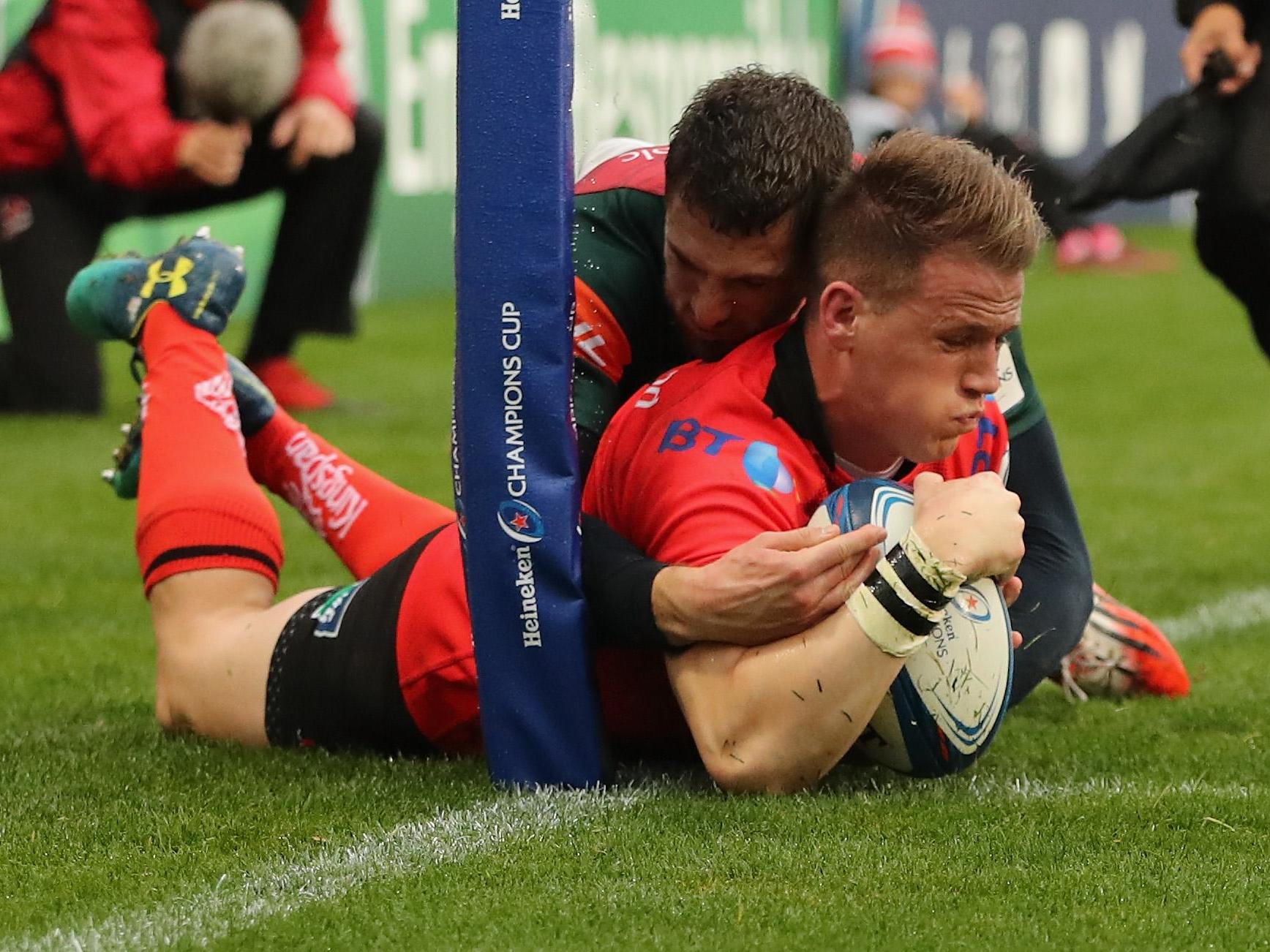 Craig Gilroy is knocked into touch by Jonah Holmes as he attempts to touch down for a try