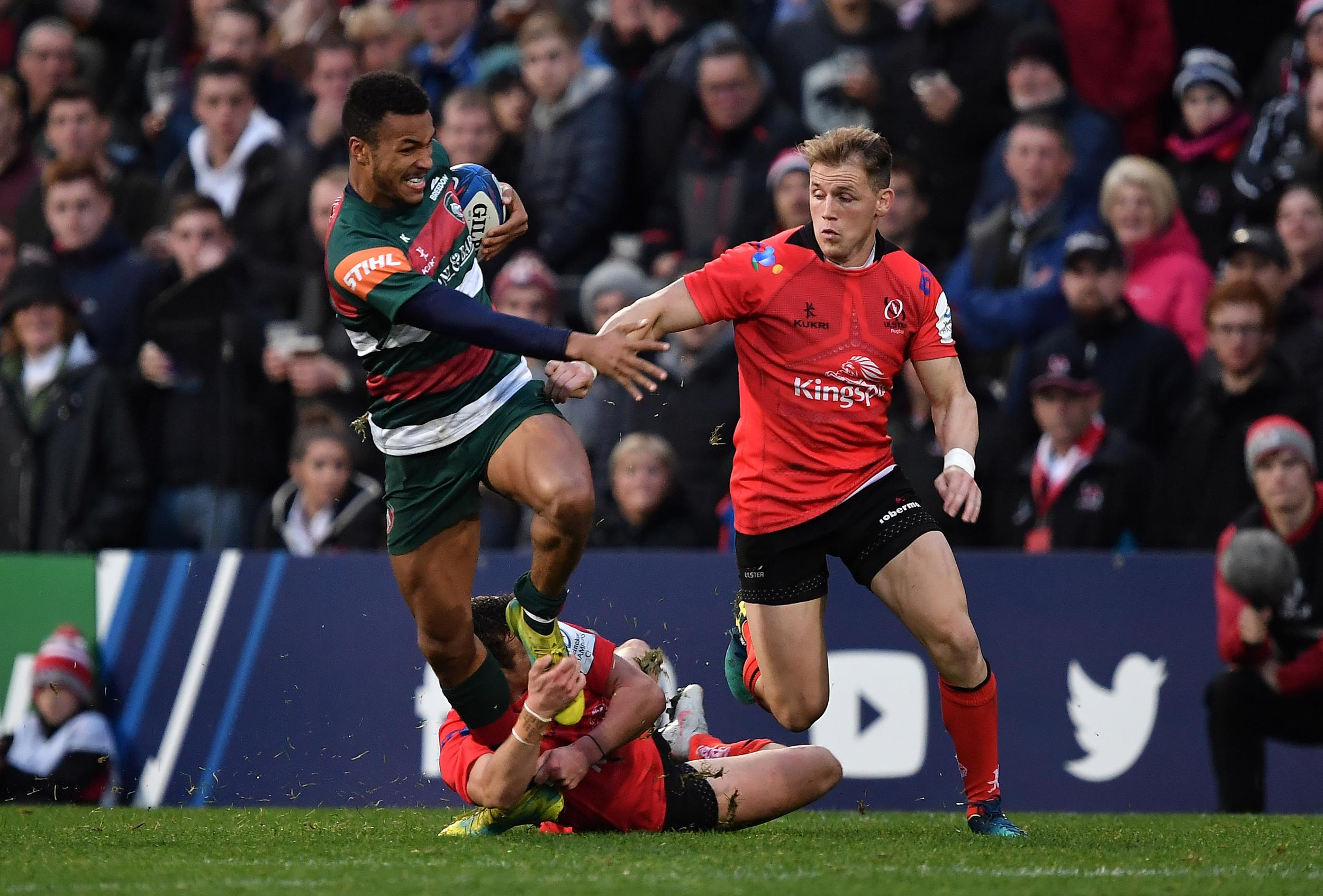 Jordan Olowofela tries to break free of a Craig Gilroy tackle