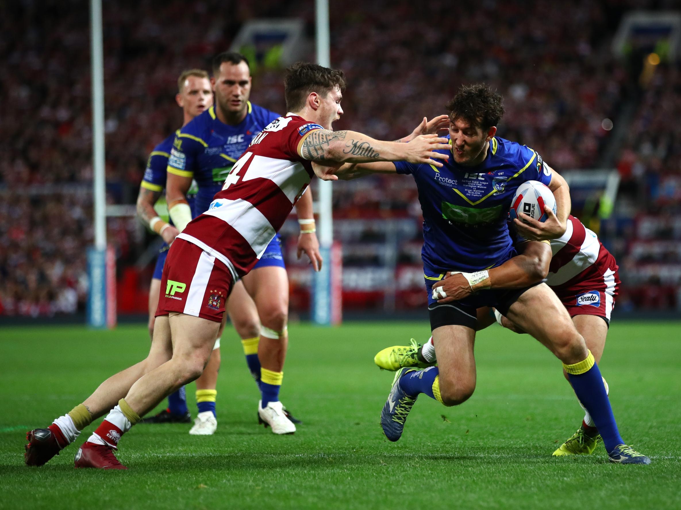 Stefan Ratchford is stopped in his tracks by the Wigan defence