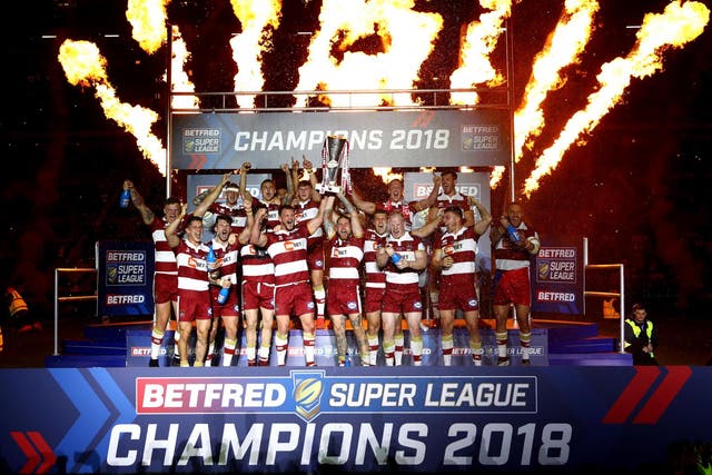 Wigan Warriors celebrate their victory at Old Trafford