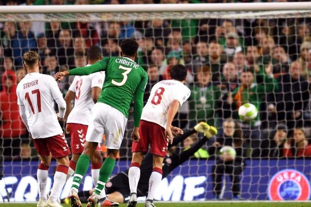 Cyrus Christie with a shot on goal for Ireland