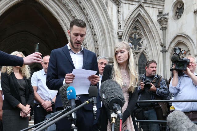 Charlie Gard's parents Chris Gard and Connie Yates speak to the media outside the High Court, London, after they ended their legal fight over treatment for the terminally-ill baby