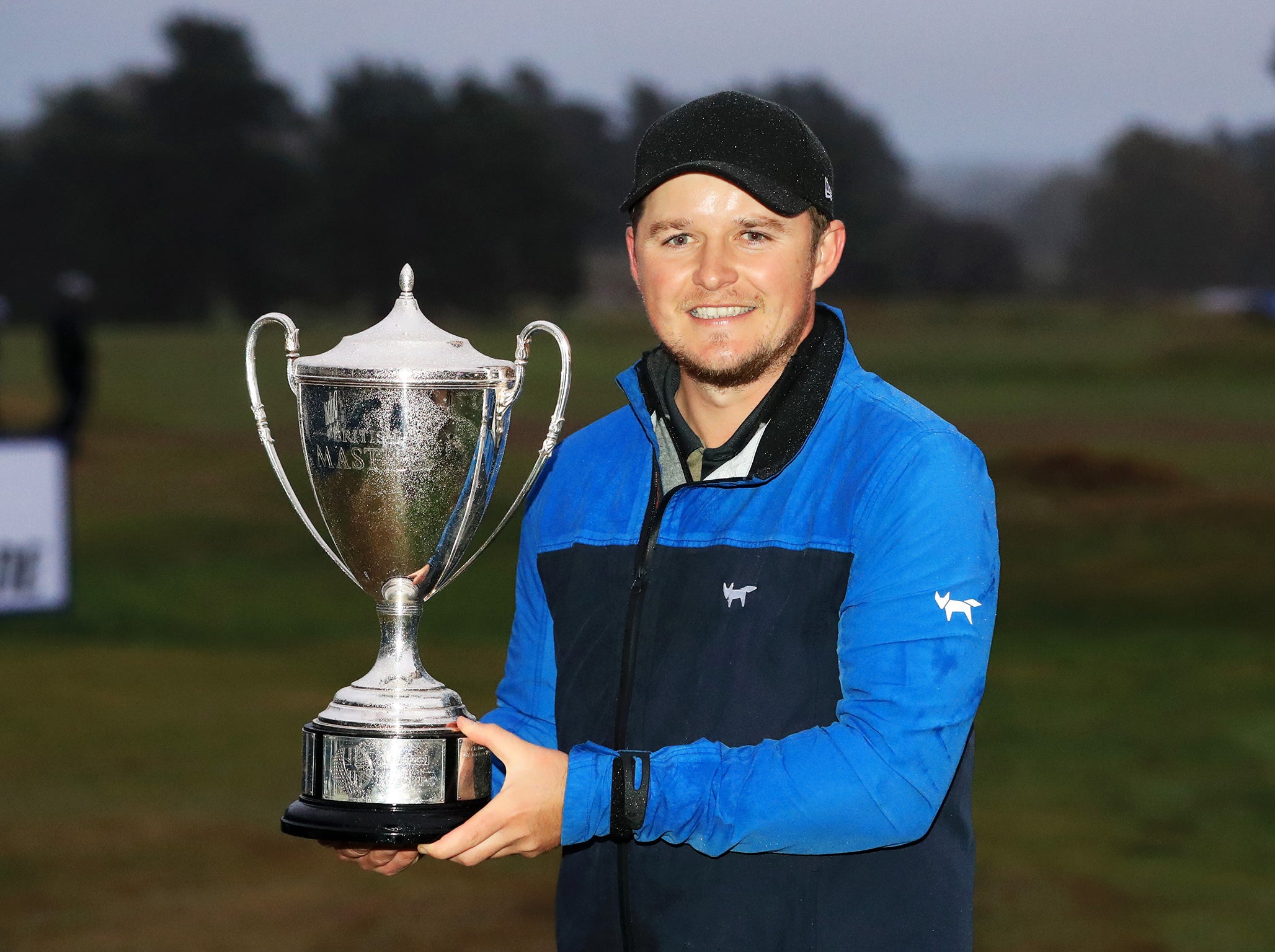 Eddie Pepperell poses with his trophy